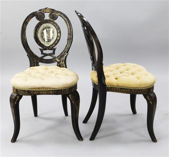 A pair of mid 19th century gilt lacquered mahogany effect boudoir chairs, (a.f.)